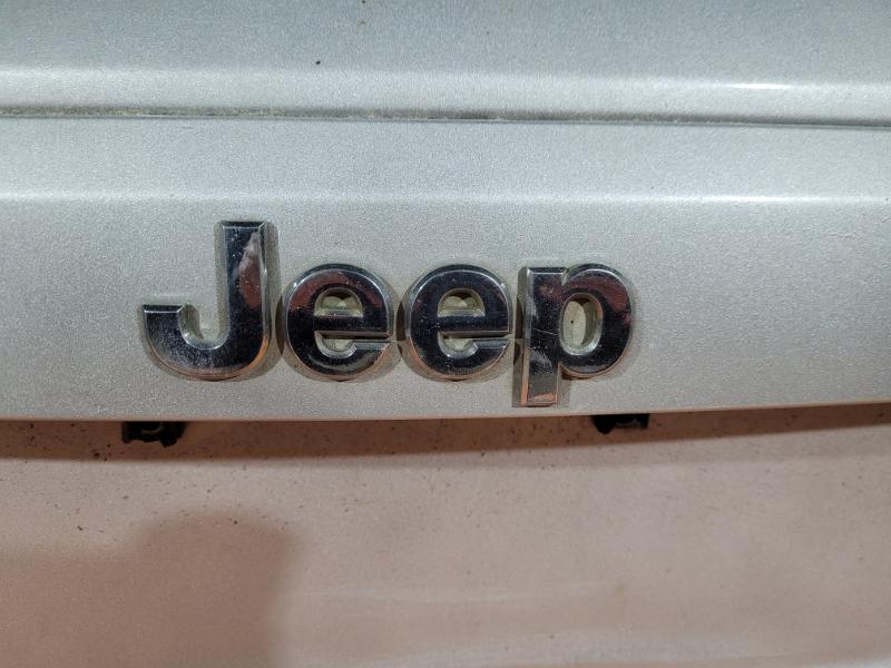 Значок задней ляды Jeep Patriot 2009 внедорожник 2.4 бензин 55157088AC Б/У