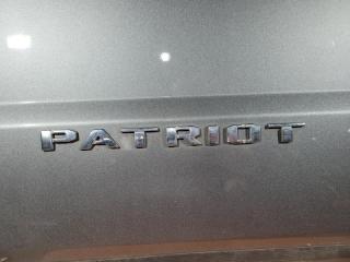 Эмблема Jeep Patriot 2012